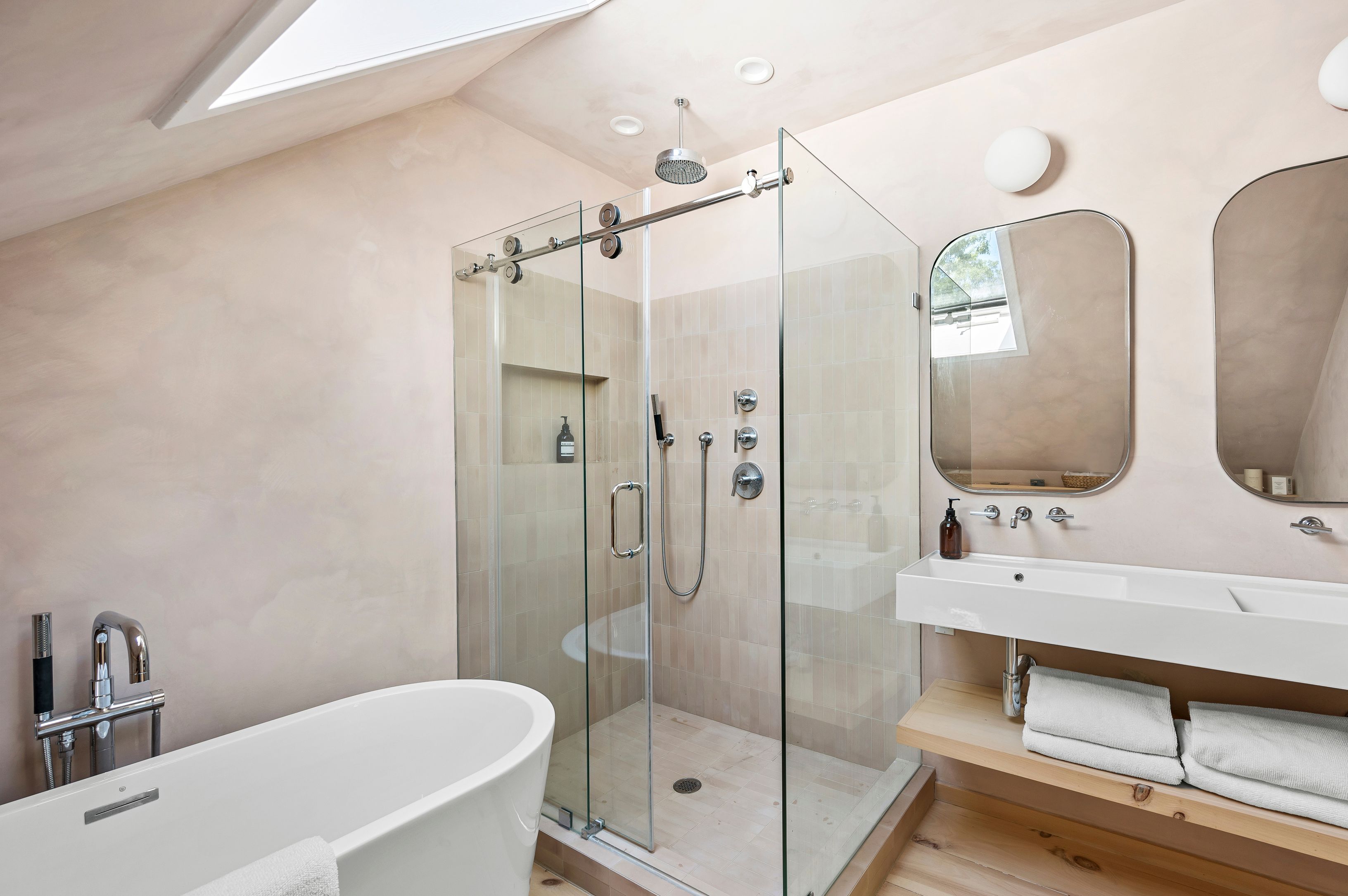 97 Swamp Road East Hampton, NY 11937 - Photo 19 of 28 a bathroom with a double vanity sink mirror and shower