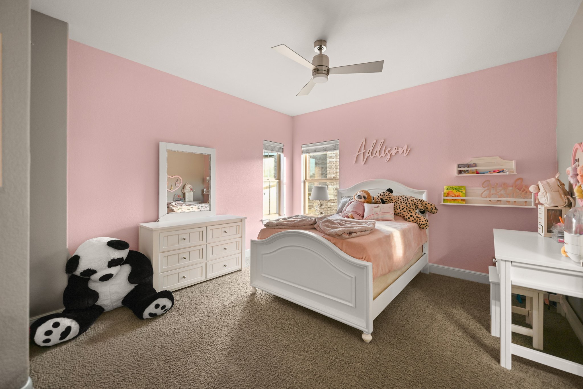 22524 Rock Wren Road Spicewood, TX 78669 - Photo 23 of 40 Soft pink walls with white trim and carpeting