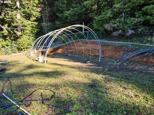 a view of a pool with a yard