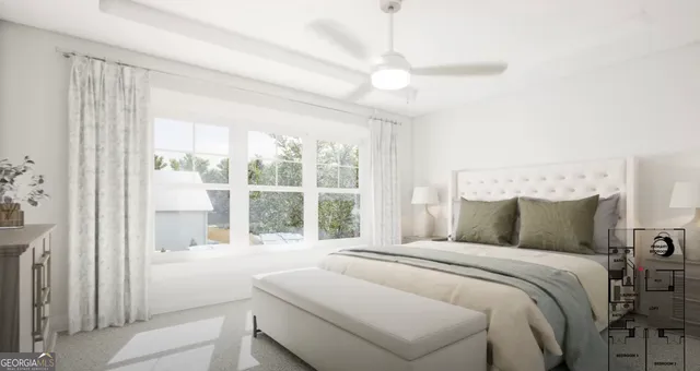 a bedroom with a large bed and a large window