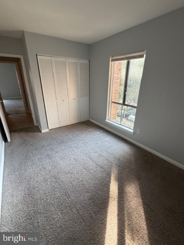 2311 Freetown Court, Unit 19/21C Reston, VA 20191 - Photo 11 of 20 an empty room with windows
