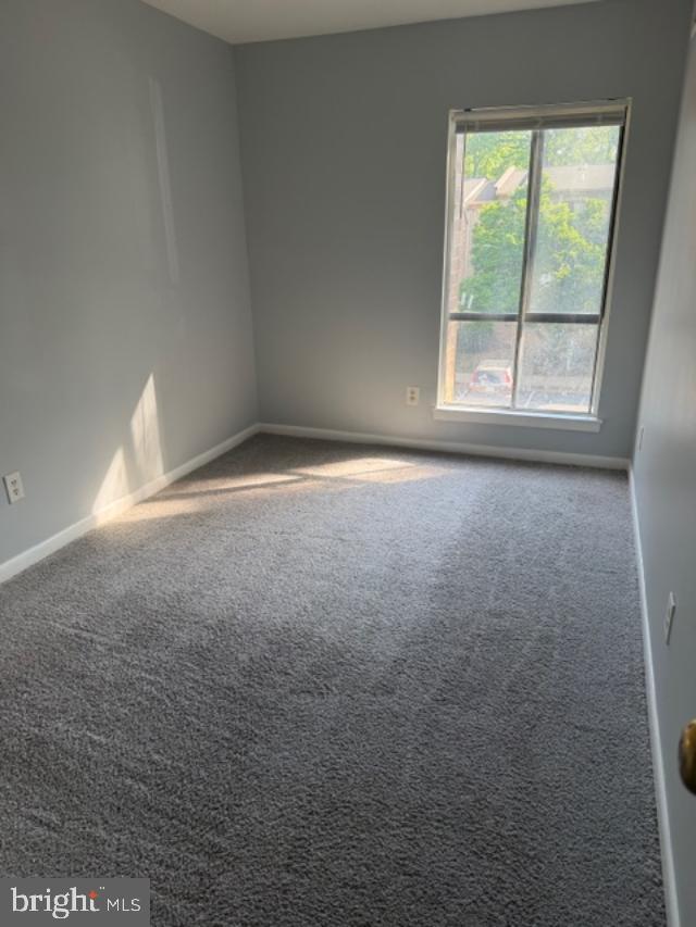 2311 Freetown Court, Unit 19/21C Reston, VA 20191 - Photo 13 of 20 an empty room with a window
