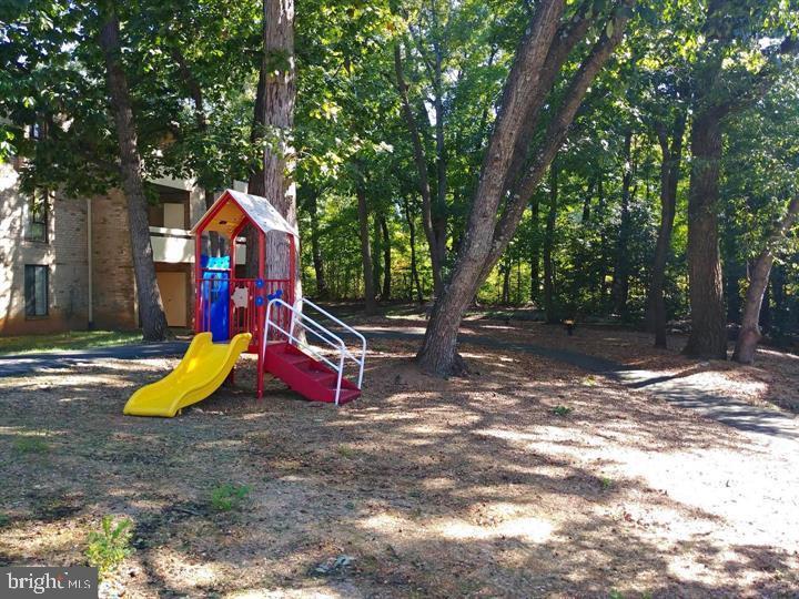 2311 Freetown Court, Unit 19/21C Reston, VA 20191 - Photo 17 of 20 a view of a park with slide