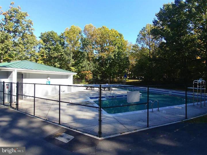 2311 Freetown Court, Unit 19/21C Reston, VA 20191 - Photo 19 of 20 a view of a street with houses
