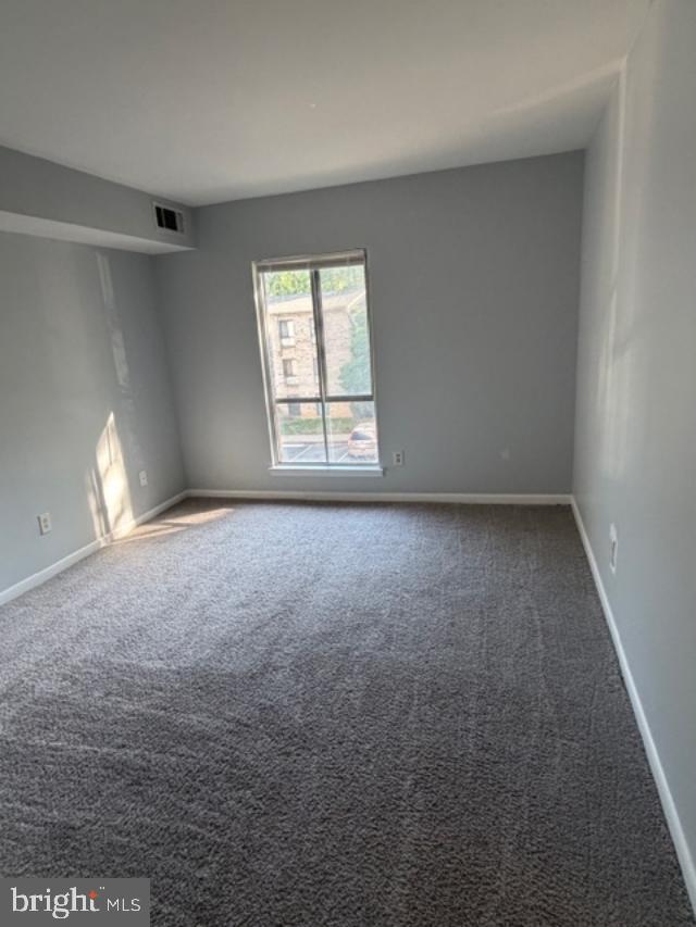 2311 Freetown Court, Unit 19/21C Reston, VA 20191 - Photo 9 of 20 an empty room with windows