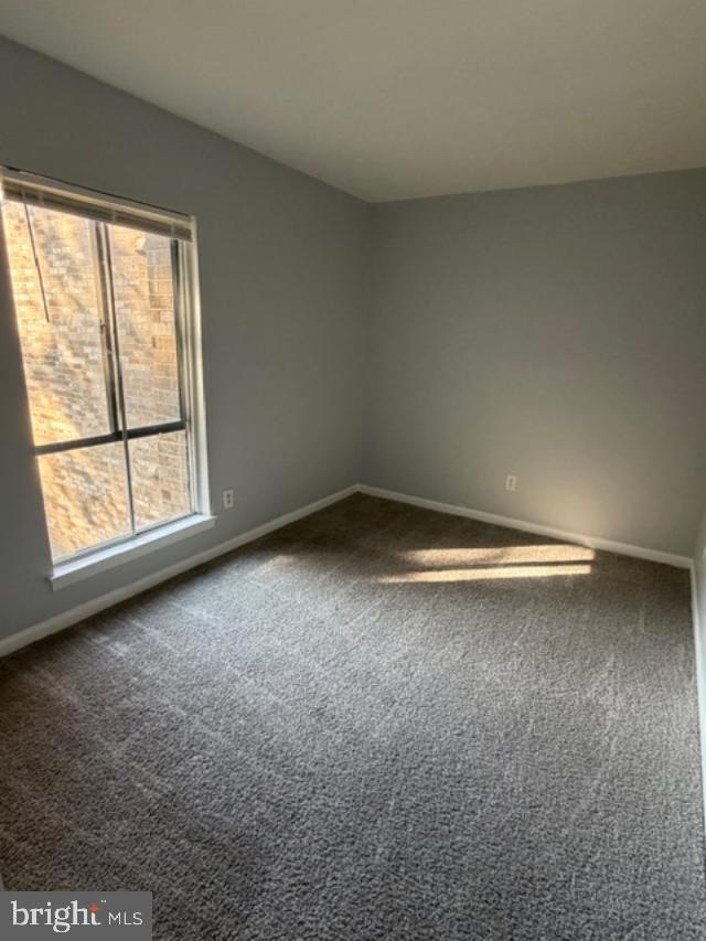 2311 Freetown Court, Unit 19/21C Reston, VA 20191 - Photo 10 of 20 an empty room with a window