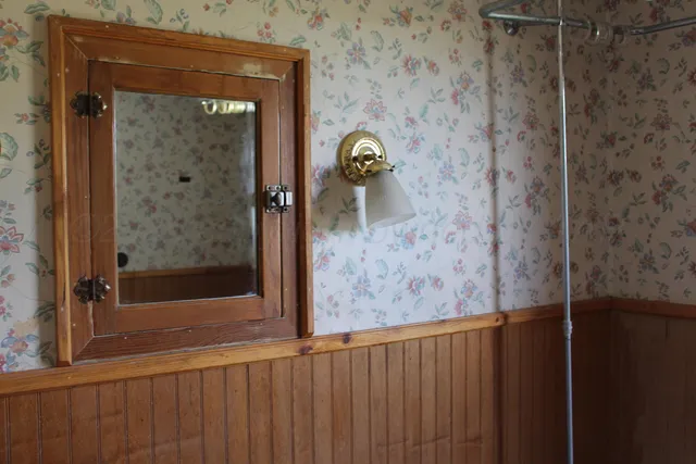 a kitchen with a sink stove and window