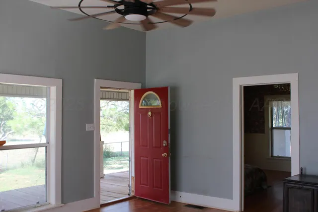 a backyard of a house with lots of green space
