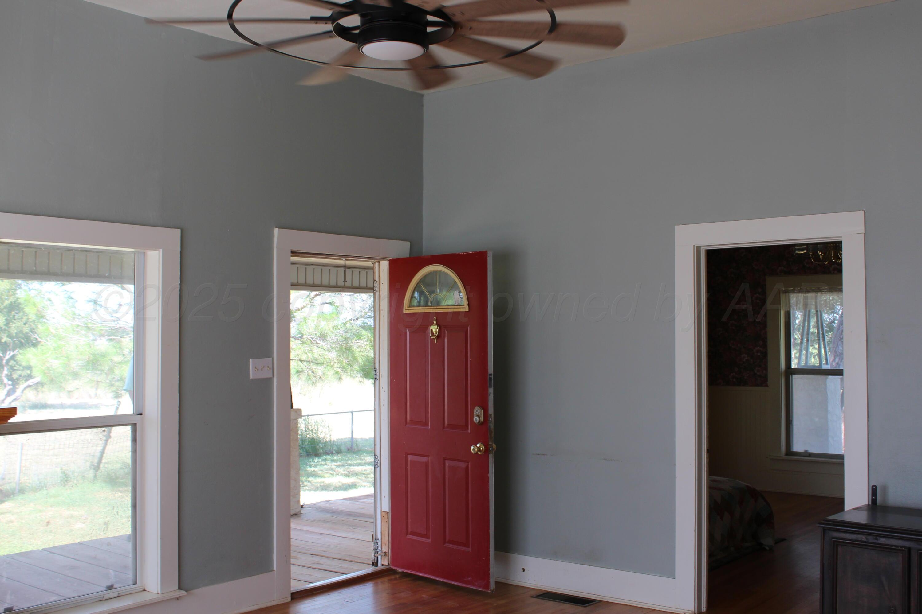 14330 Broome Road Memphis, TX 79245 - Photo 45 of 63 a view of front door with a mirror