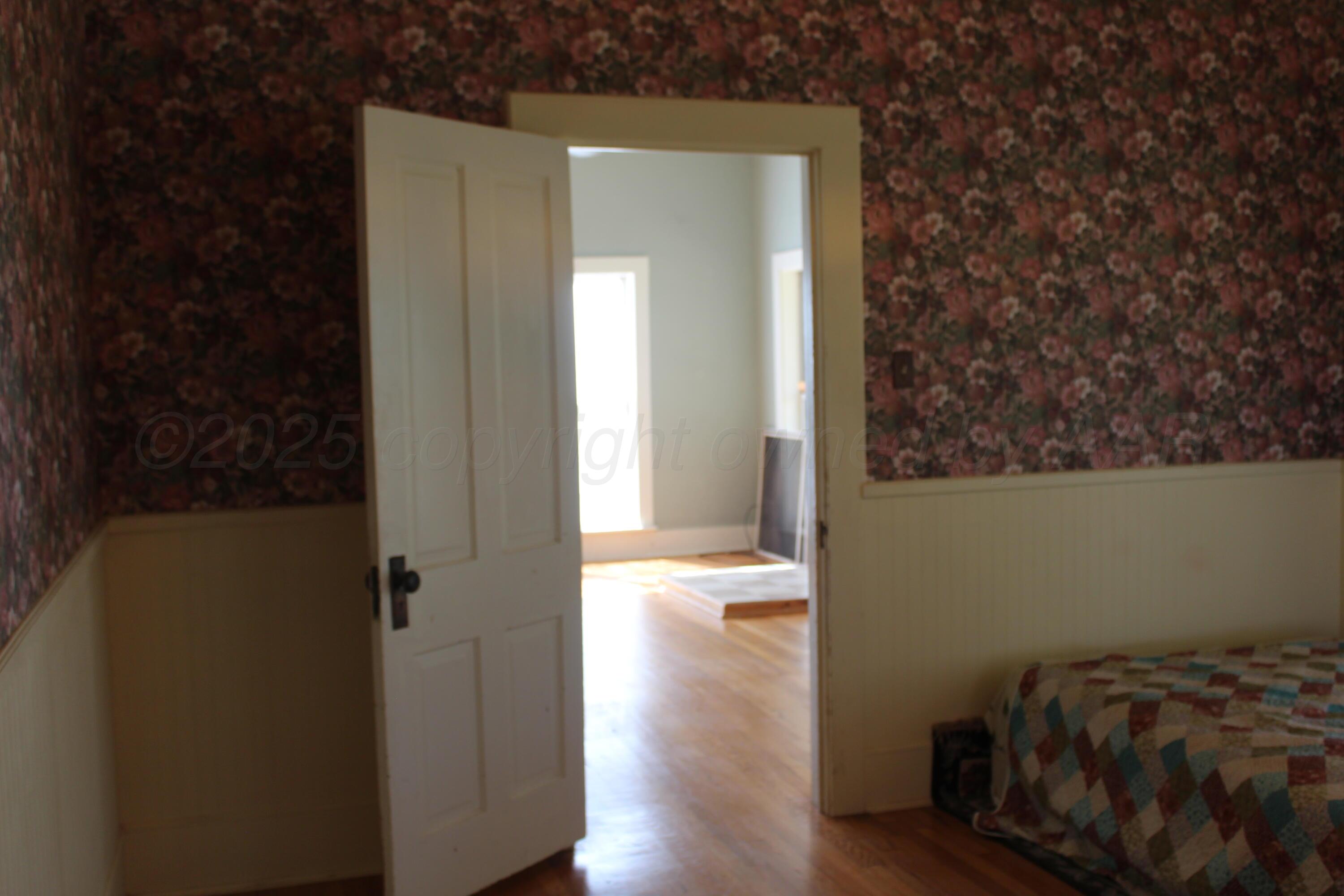 14330 Broome Road Memphis, TX 79245 - Photo 7 of 63 a view of bedroom with wooden floor