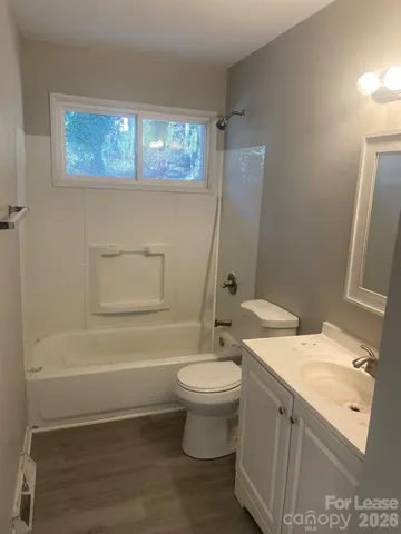 a view of outdoor space with trees all around