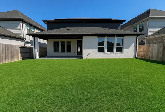 a view of a house with a garden