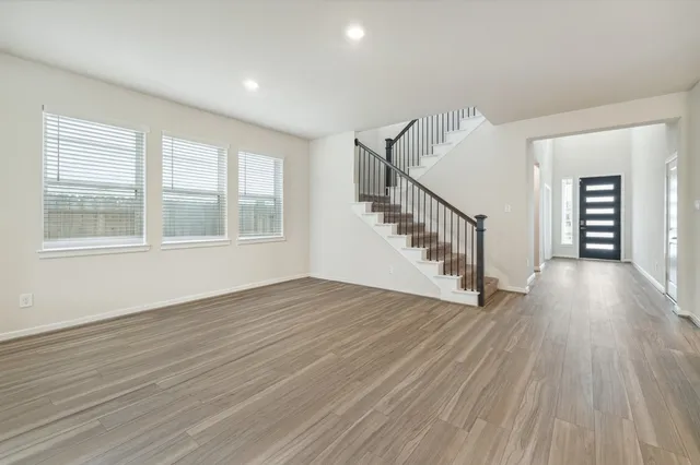 a large kitchen with stainless steel appliances kitchen island a large island in the center