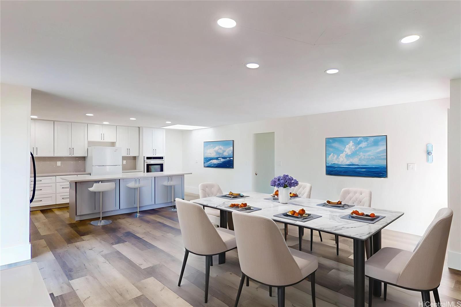 1543 Mahie Place Honolulu, HI 96818 - Photo 1 of 25 a view of a dining room with furniture and a kitchen