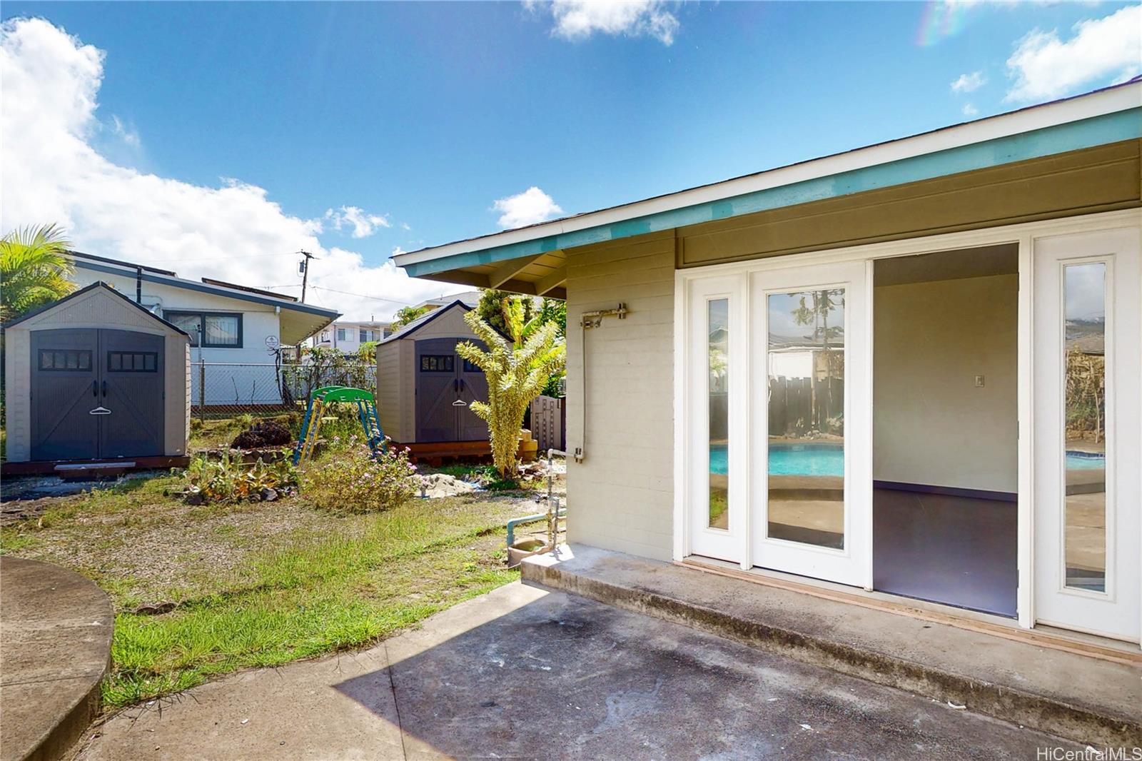 1543 Mahie Place Honolulu, HI 96818 - Photo 17 of 25 a view of a house with small yard