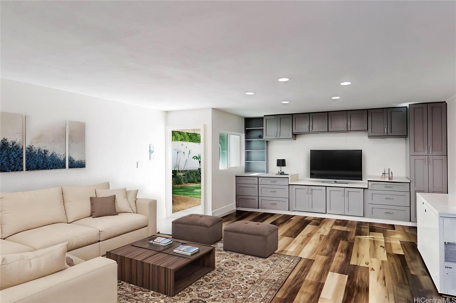 1543 Mahie Place Honolulu, HI 96818 - Photo 5 of 25 a living room with furniture and a flat screen tv