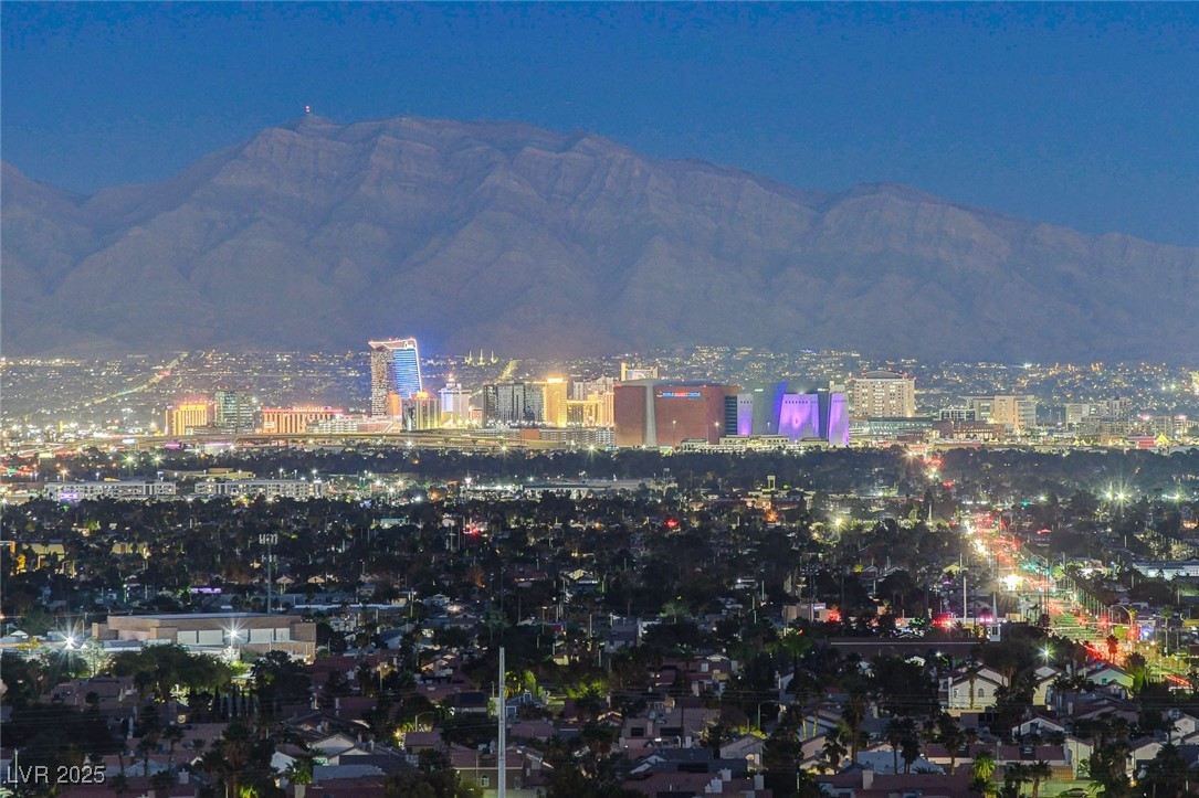 9101 Alta Drive, Unit 1406 Las Vegas, NV 89145 - Photo 54 of 69 Mountain view with a view of city lights