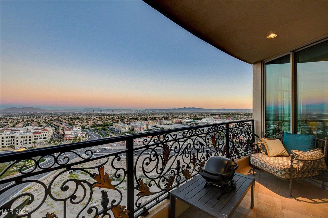 9101 Alta Drive, Unit 1406 Las Vegas, NV 89145 - Photo 60 of 69 View of balcony at dusk