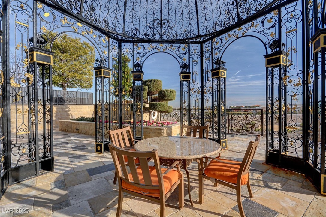 9101 Alta Drive, Unit 1406 Las Vegas, NV 89145 - Photo 63 of 69 View of patio / terrace featuring outdoor dining area