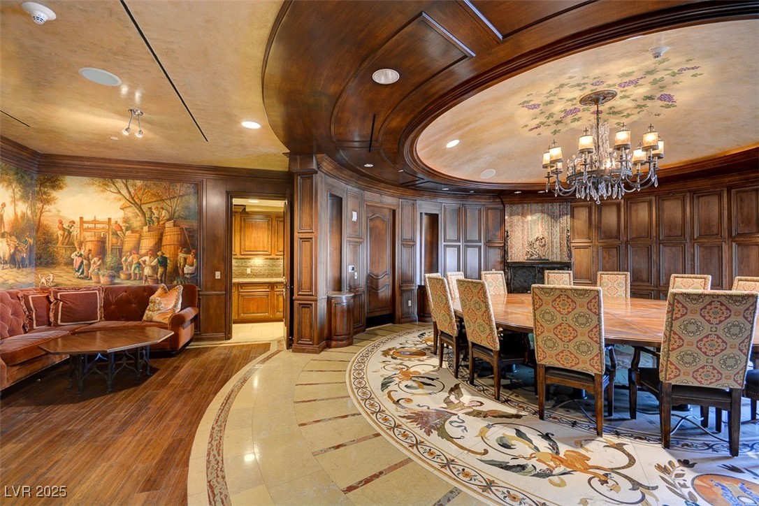 9101 Alta Drive, Unit 1406 Las Vegas, NV 89145 - Photo 68 of 69 Dining room featuring inlaid floor details, a chandelier, ornamental molding, and recessed lighting