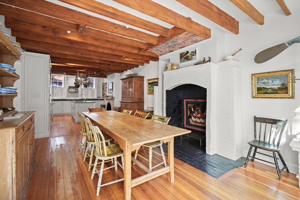 32 West Cedar Street Boston, MA 02108 - Photo 15 of 39 a view of a dining room with furniture and wooden floor