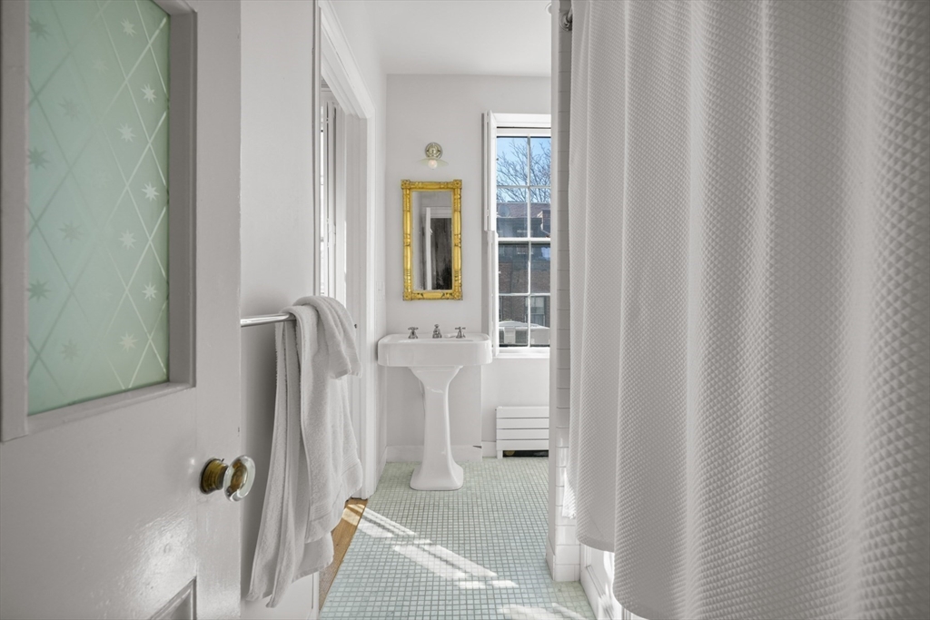 32 West Cedar Street Boston, MA 02108 - Photo 20 of 39 a bathroom with a shower