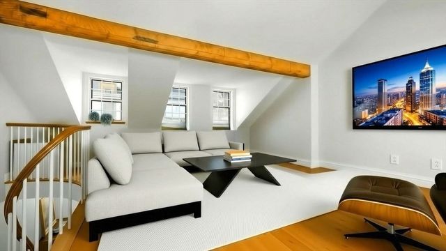 a living room with furniture and a couch