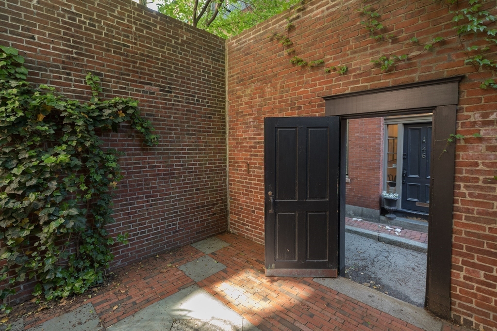 32 West Cedar Street Boston, MA 02108 - Photo 33 of 39 a view of a wooden door