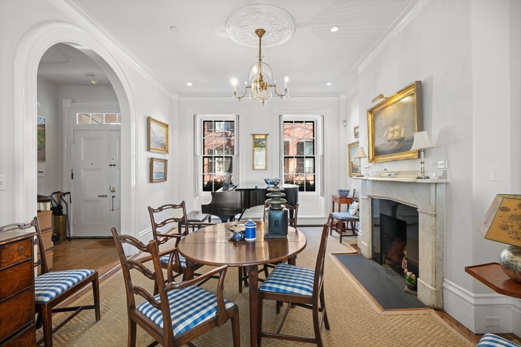 32 West Cedar Street Boston, MA 02108 - Photo 8 of 39 a view of a livingroom with furniture and a fireplace
