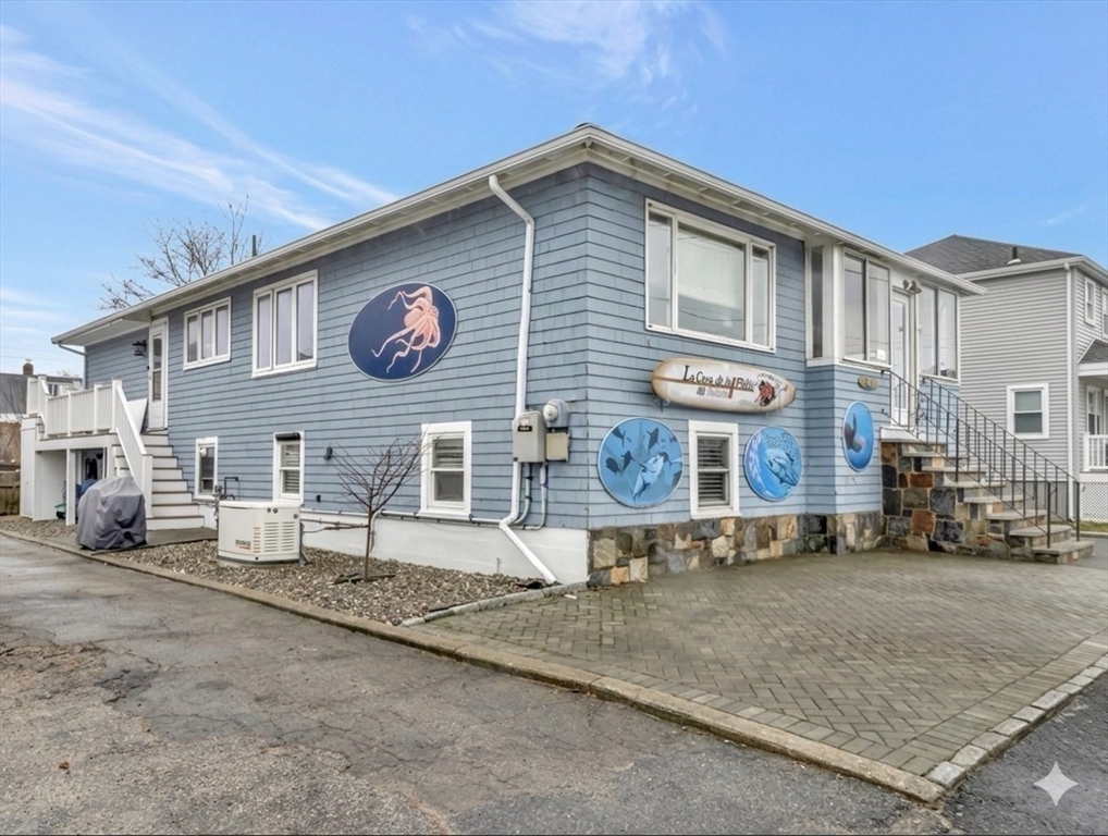 48 A B Street Hull, MA 02045 - Photo 2 of 41 a front view of a house with garden