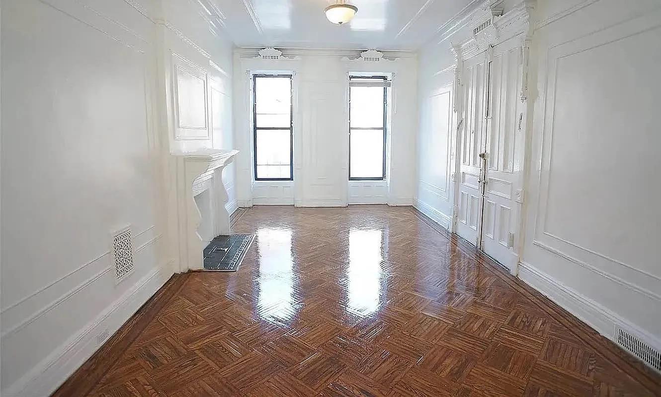502 Madison Street, Unit 2 Brooklyn, NY 11221 - Photo 1 of 1 a view of entryway with window and wooden floor