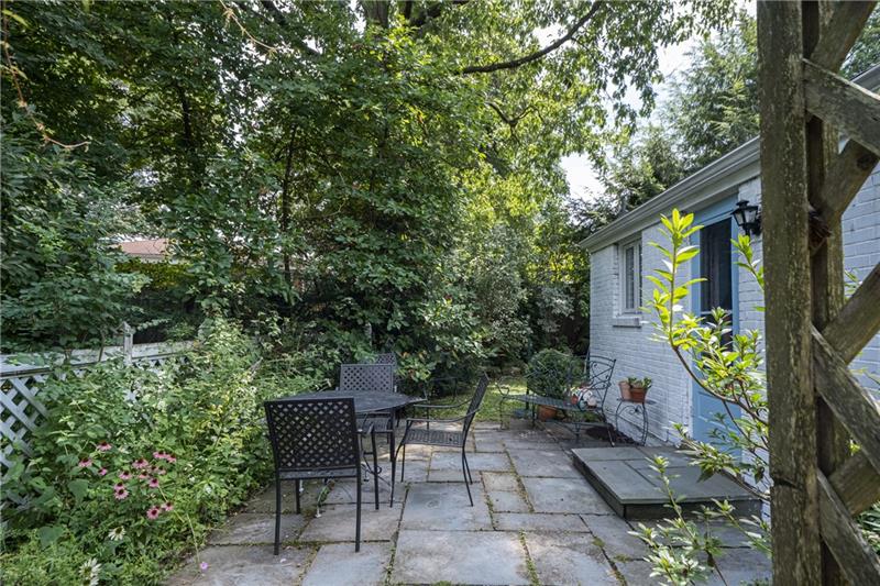 128 Marlboro Road Pittsburgh, PA 15238 - Photo 18 of 21 Private Pennsylvania Bluestone Patio off kitchen. (Green Paints.)