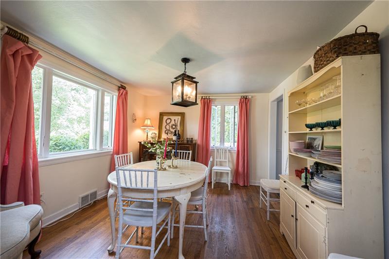 Sunlit dining room. Great space for initimate meals or gathering with family and friends.