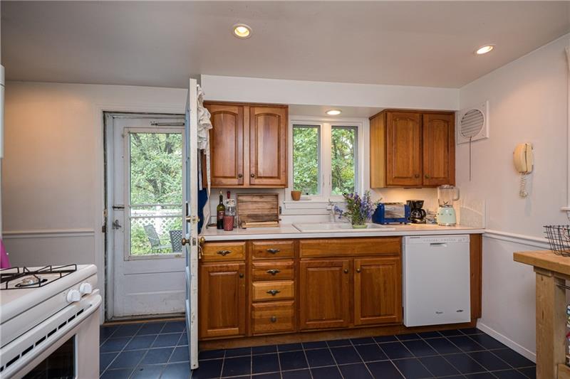 Eat-In-Kitchen exits to private patio.  