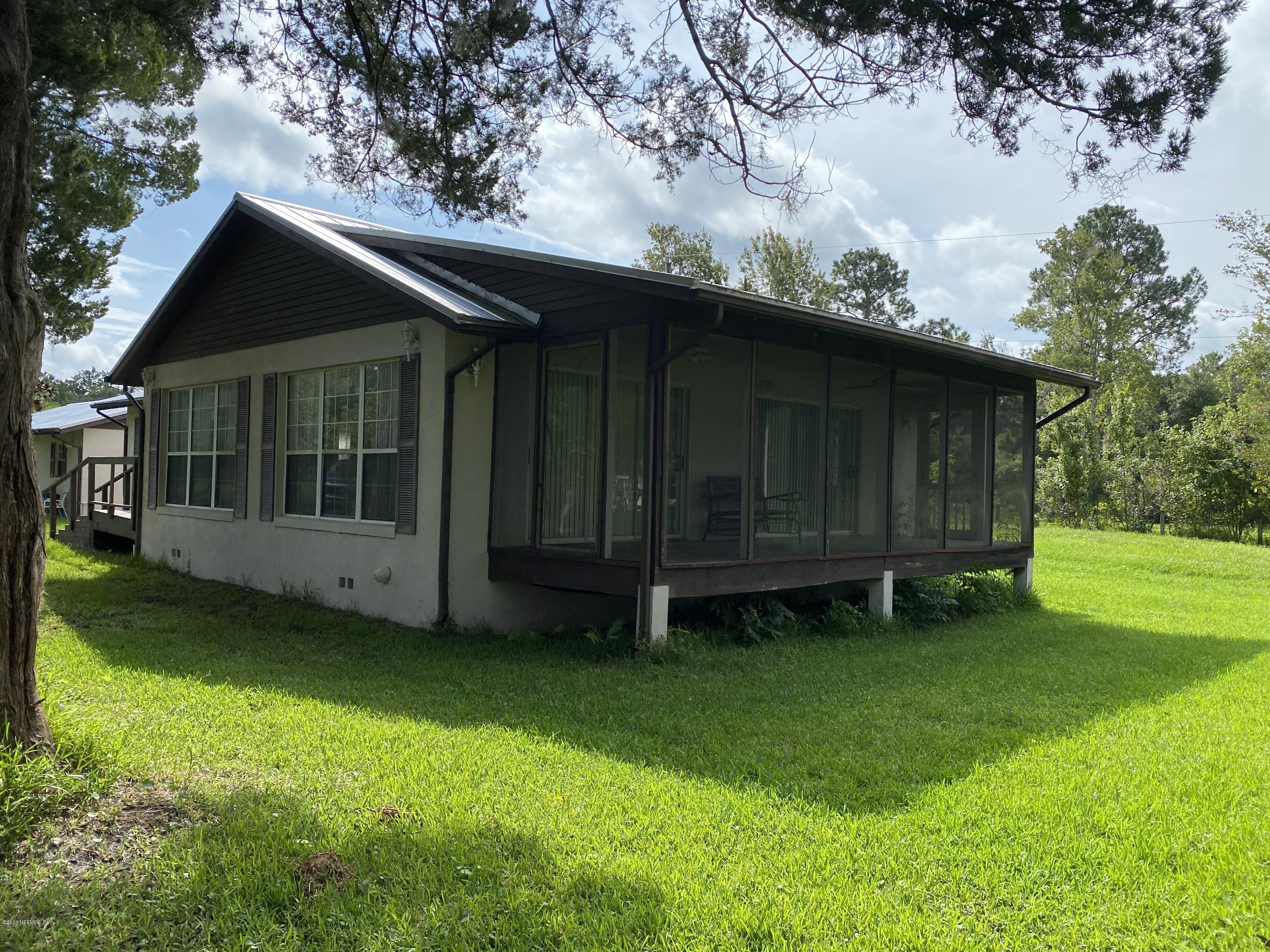 2515 Pellicer Road St. Augustine, FL 32092 - Photo 3 of 22 a view of a house with a yard