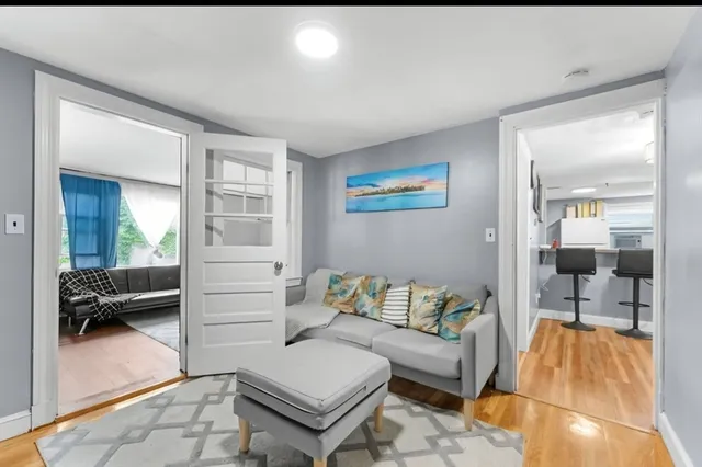 a living room with furniture and a table