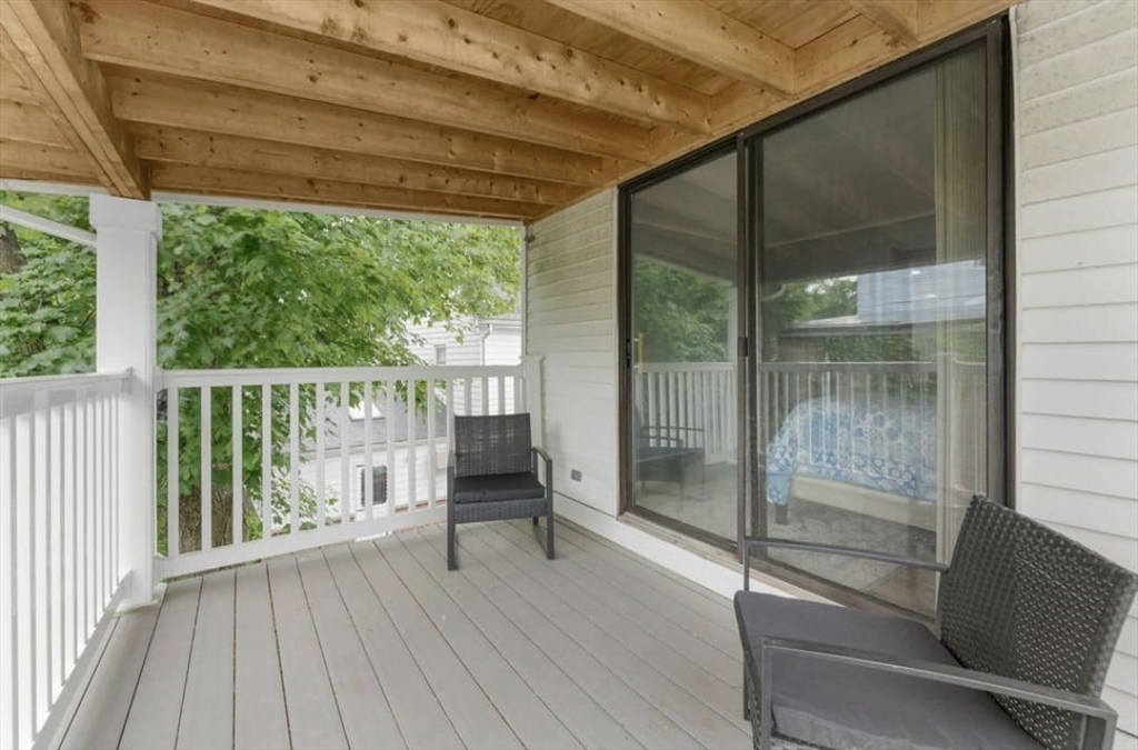 44 Woodlawn Avenue, Unit 2 Everett, MA 02149 - Photo 17 of 18 a view of outdoor space with wooden floor and window