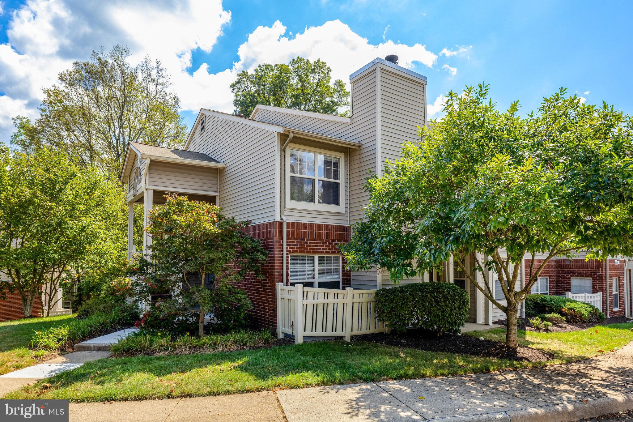 1791 Jonathan Way, Unit 1791B Reston, VA 20190 - Photo 18 of 27 front view of a house with a yard