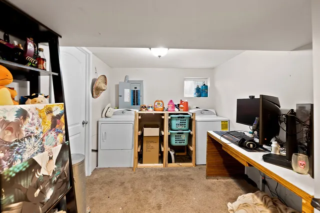 a kitchen with refrigerator and window