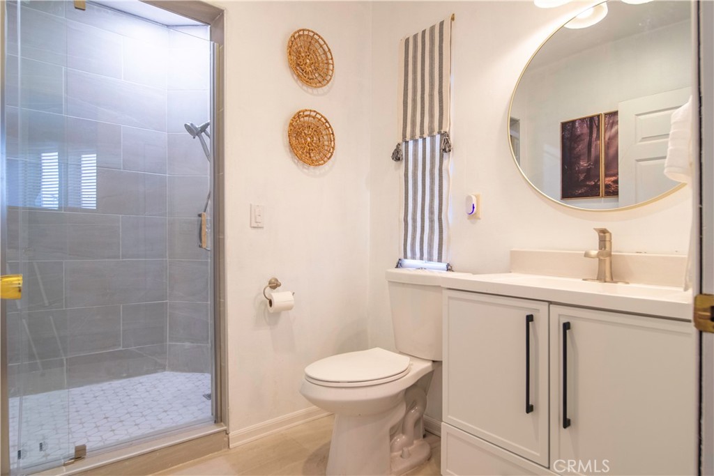 38340 Carrillo Road Fallbrook, CA 92028 - Photo 27 of 33 a bathroom with a sink a toilet and shower