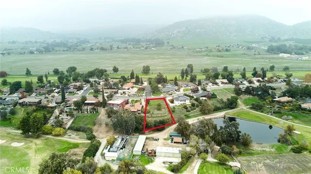 an aerial view of residential house with outdoor space