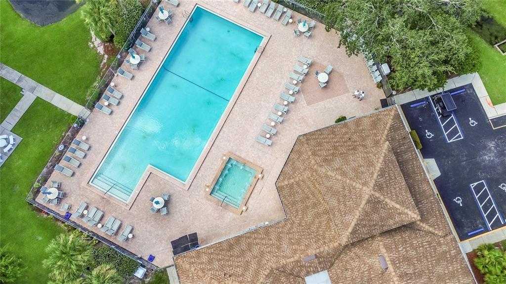 6338 Spring Flower Drive, Unit 21 New Port Richey, FL 34653 - Photo 15 of 18 an aerial view of a house with a garden