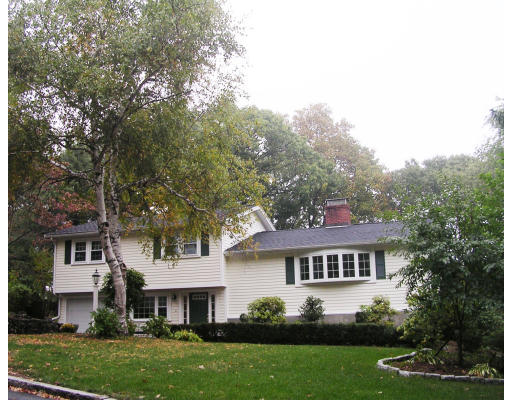 32 Squire Road Winchester, MA 01890 - Photo 1 of 6 a front view of a house with a garden