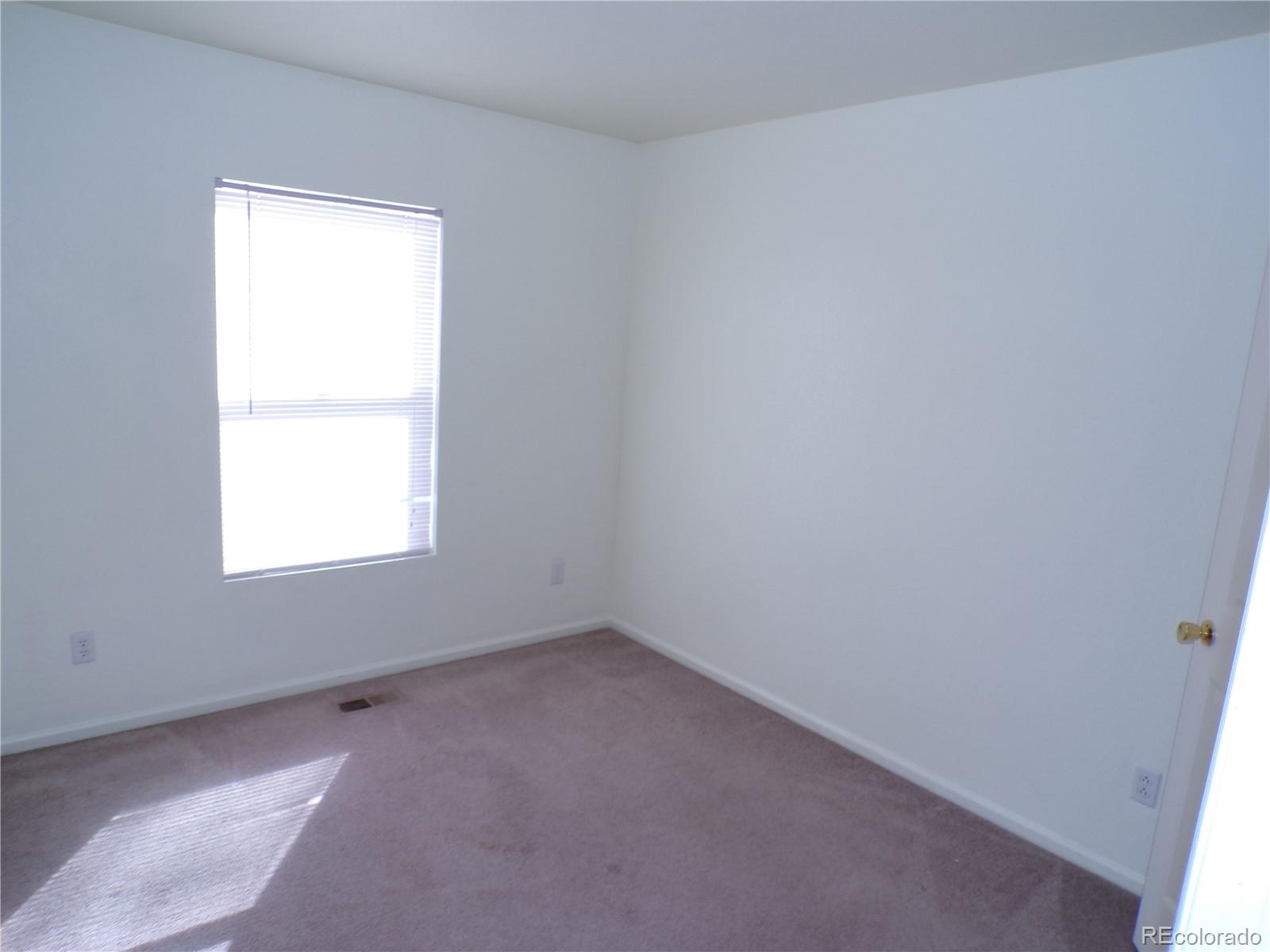 Undisclosed Address Morrison, CO 80465 - Photo 15 of 20 an empty room with a window