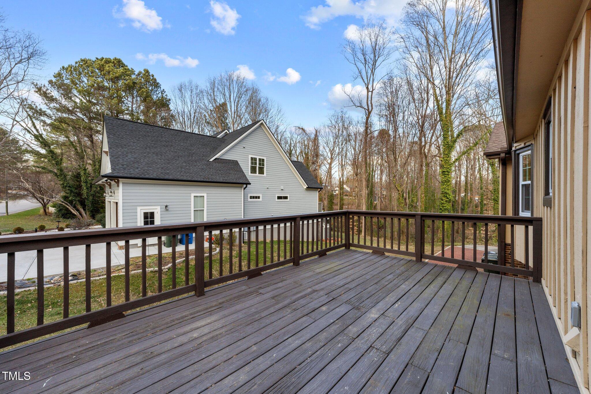 2108 Rangecrest Road Raleigh, NC 27612 - Photo 30 of 38 a view of deck with wooden floor and fence