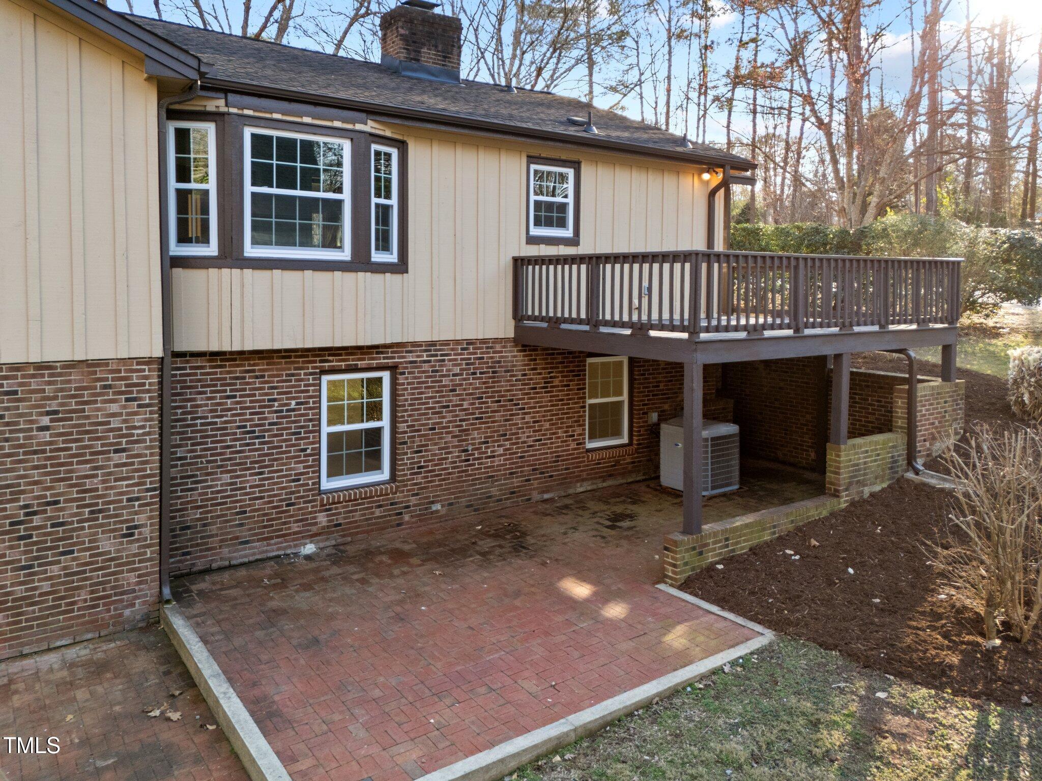2108 Rangecrest Road Raleigh, NC 27612 - Photo 32 of 38 a front view of a house with a garden