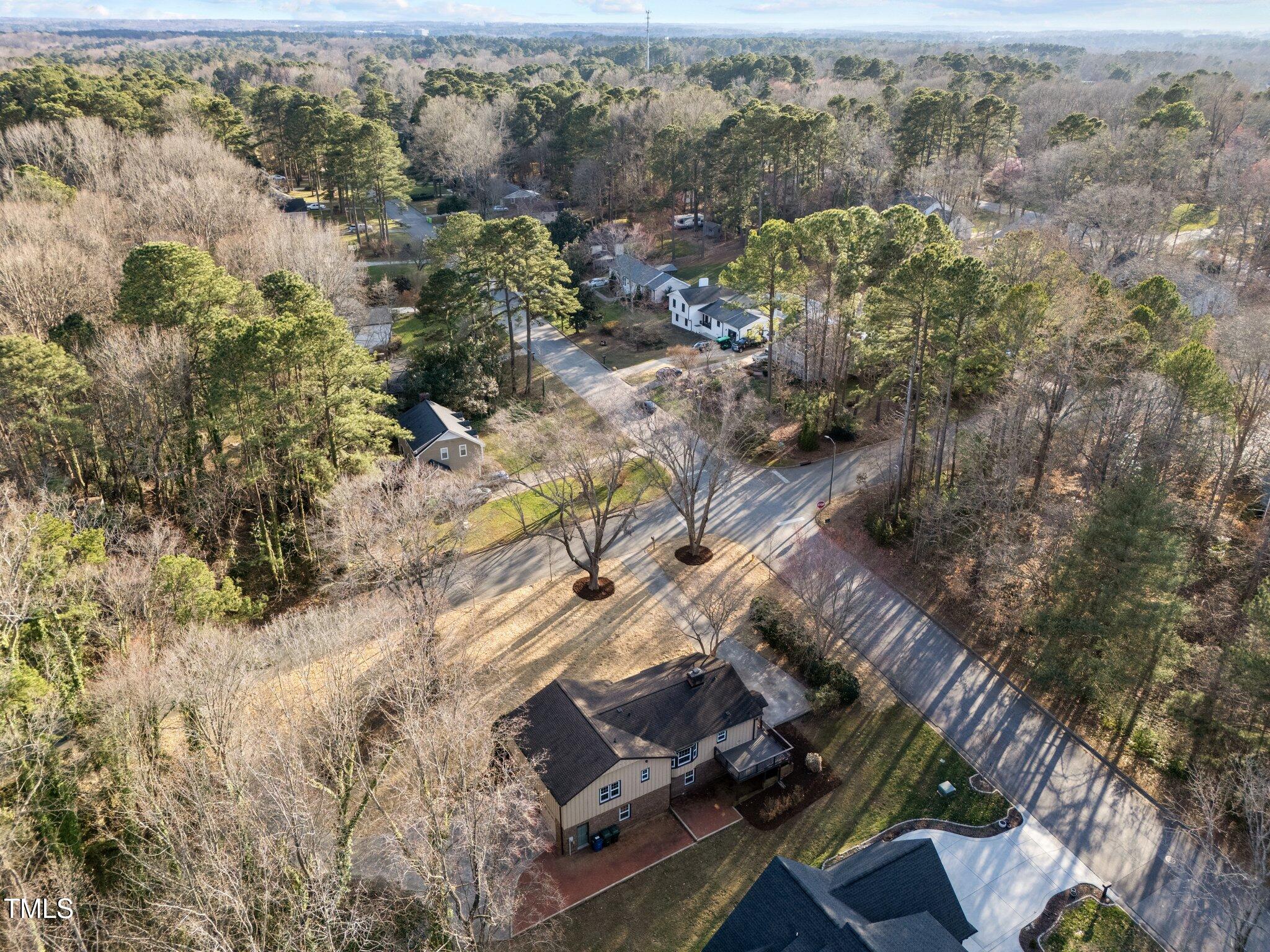 2108 Rangecrest Road Raleigh, NC 27612 - Photo 38 of 38 an aerial view of a house with a yard