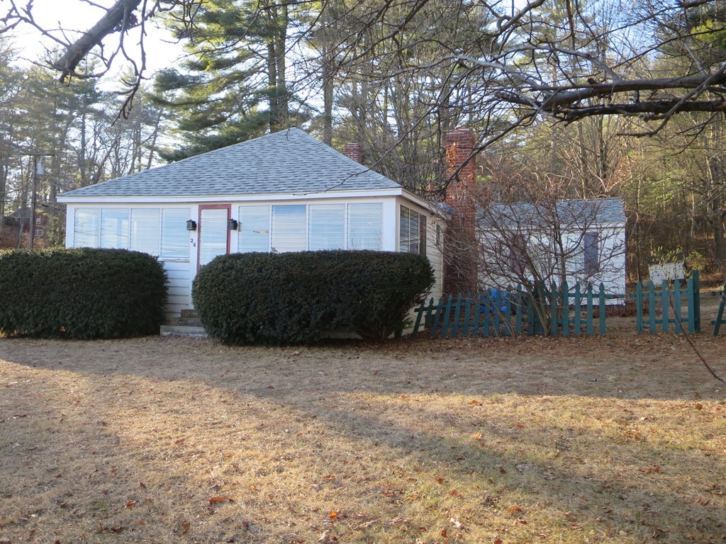 28 Craig Road Holland, MA 01521 - Photo 15 of 19 a front view of a house with a yard