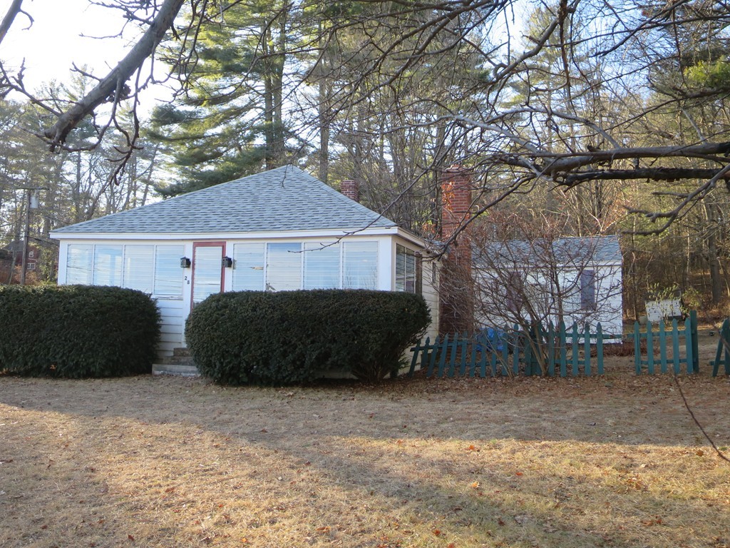 28 Craig Road Holland, MA 01521 - Photo 16 of 19 a front view of a house with a yard
