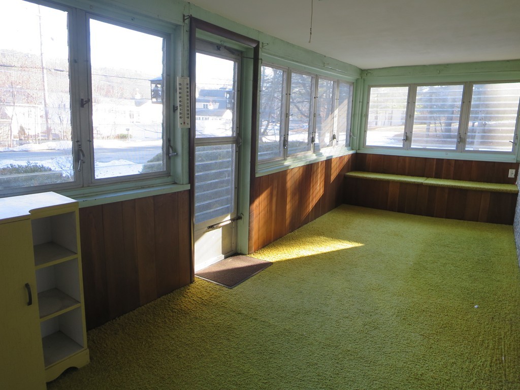 28 Craig Road Holland, MA 01521 - Photo 5 of 19 a view of an empty room with a window